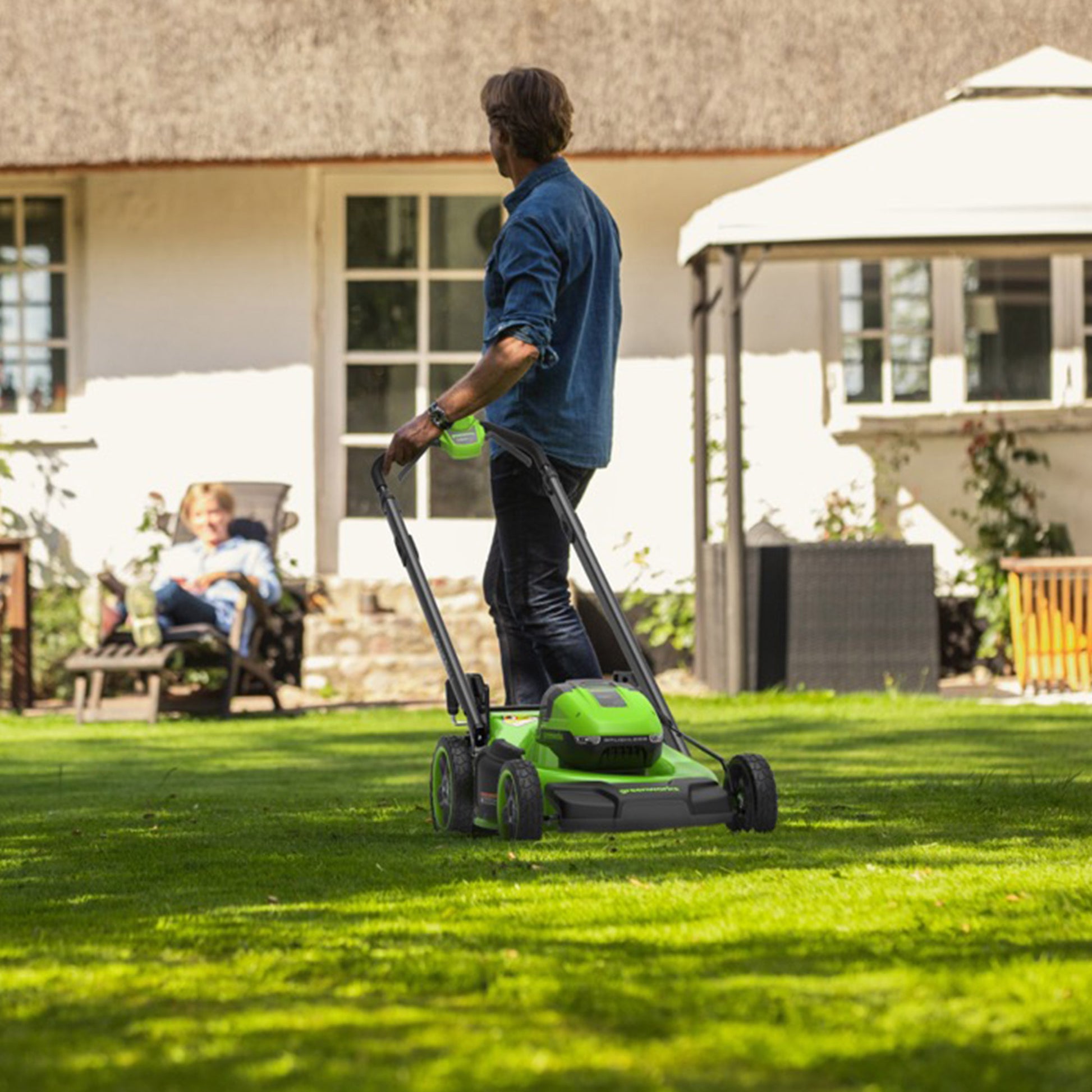 Greenworks 2X24V Mower, Trimmer, Blower Combo Kit with (4) 4Ah Batteries
